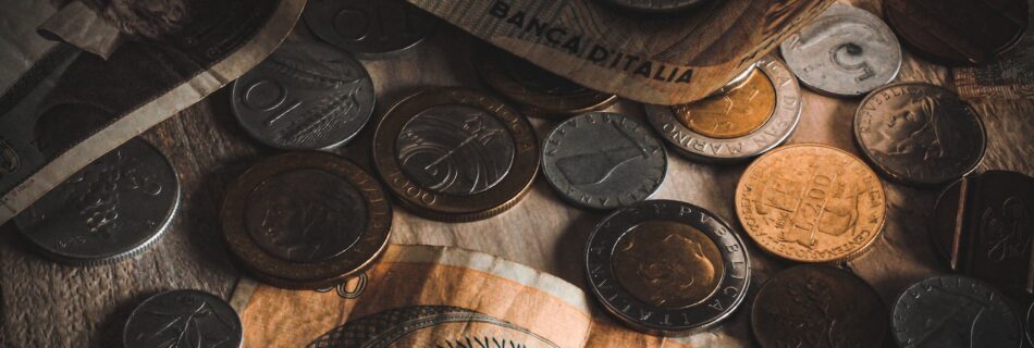 banknotes and coins on table